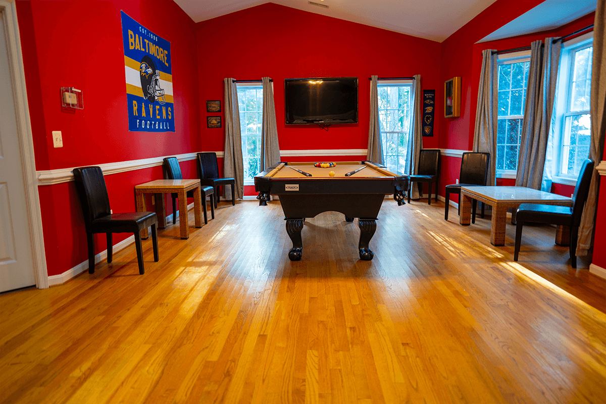 The pool table in the red game room at the Arnold home
