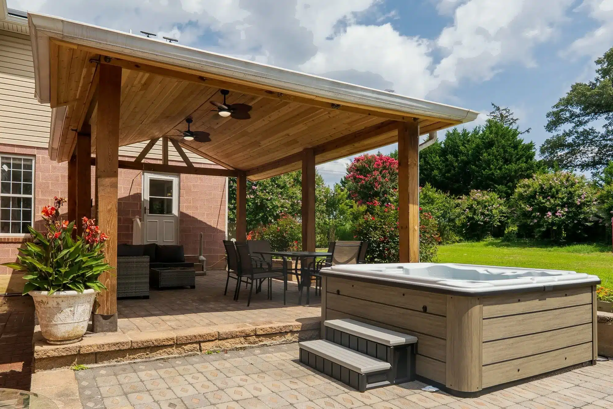 The covered patio and hot tub at the Silver Spring house
